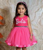 Young girl wearing a pink 'Barbie' dress - Fashion Designer in Pune