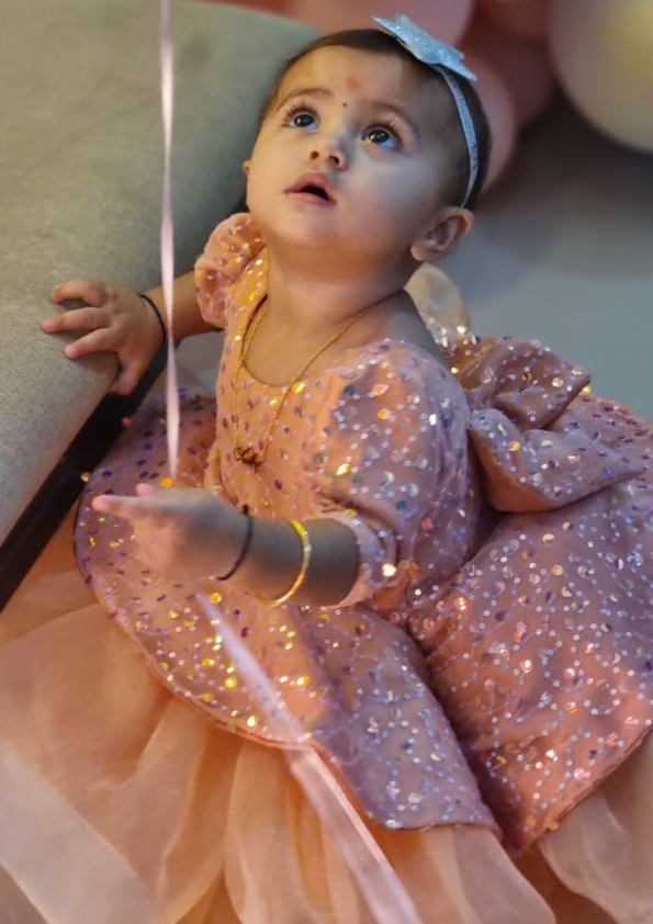 Baby in a sparkling pink outfit - Fashion Designer in Pune