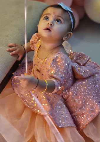Baby in a sparkling pink outfit - Fashion Designer in Pune