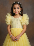 girl in a yellow dress with ruffled sleeves - Fashion Designer in Pune