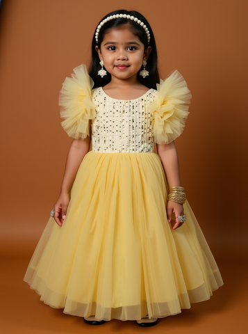 girl in a yellow dress with ruffled sleeves - Fashion Designer in Pune