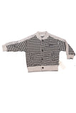Children's outfit with houndstooth jacket and gray pants on a white background - Fashion Designer in Pune