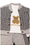 Children's outfit with houndstooth jacket and gray pants on a white background - Fashion Designer in Pune