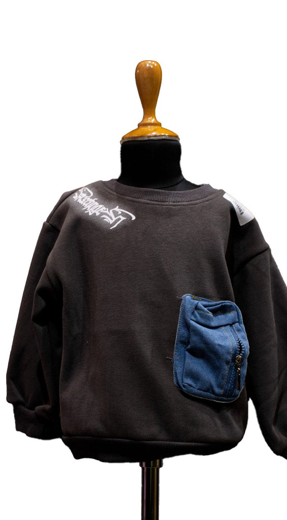 Black sweatshirt with blue pocket on a mannequin - Fashion designer in pune