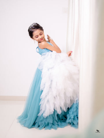 Girl in a blue dress with a white feathered skirt - Fashion Desinger in Pune