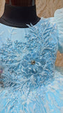 Young girl wearing a light blue lace dress - Fashion Designer in Pune